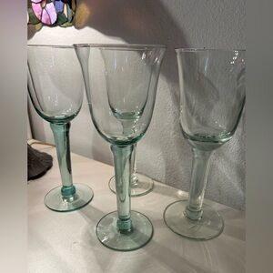 4 green, hand blown glasses. 8.75”
